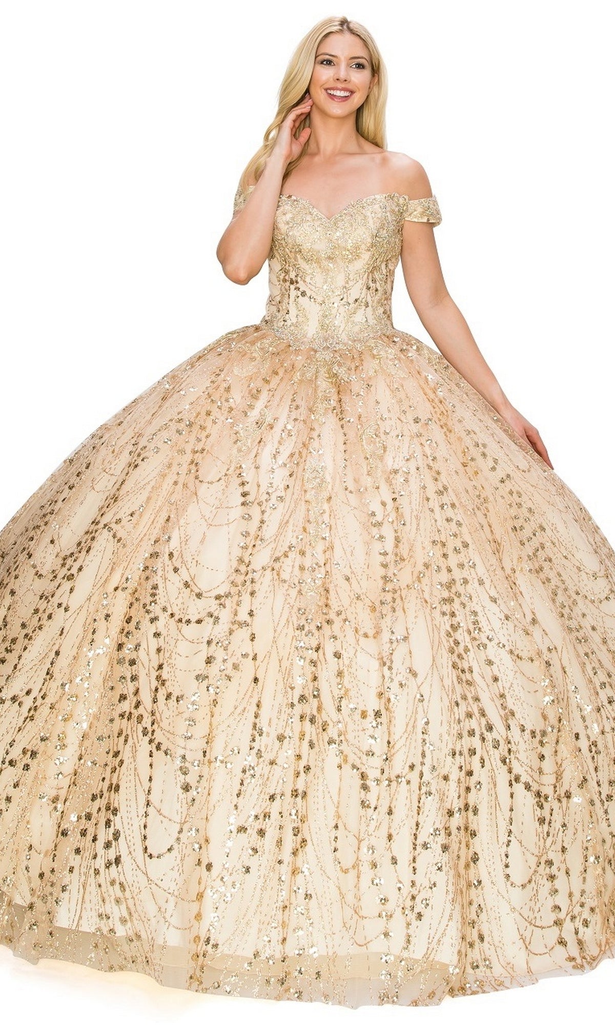 Smiling woman in the Quinceanera Ball Gown 8033J—a gold glitter off-shoulder ball gown with a full skirt, shimmering patterns, and an elegant lace-up back.